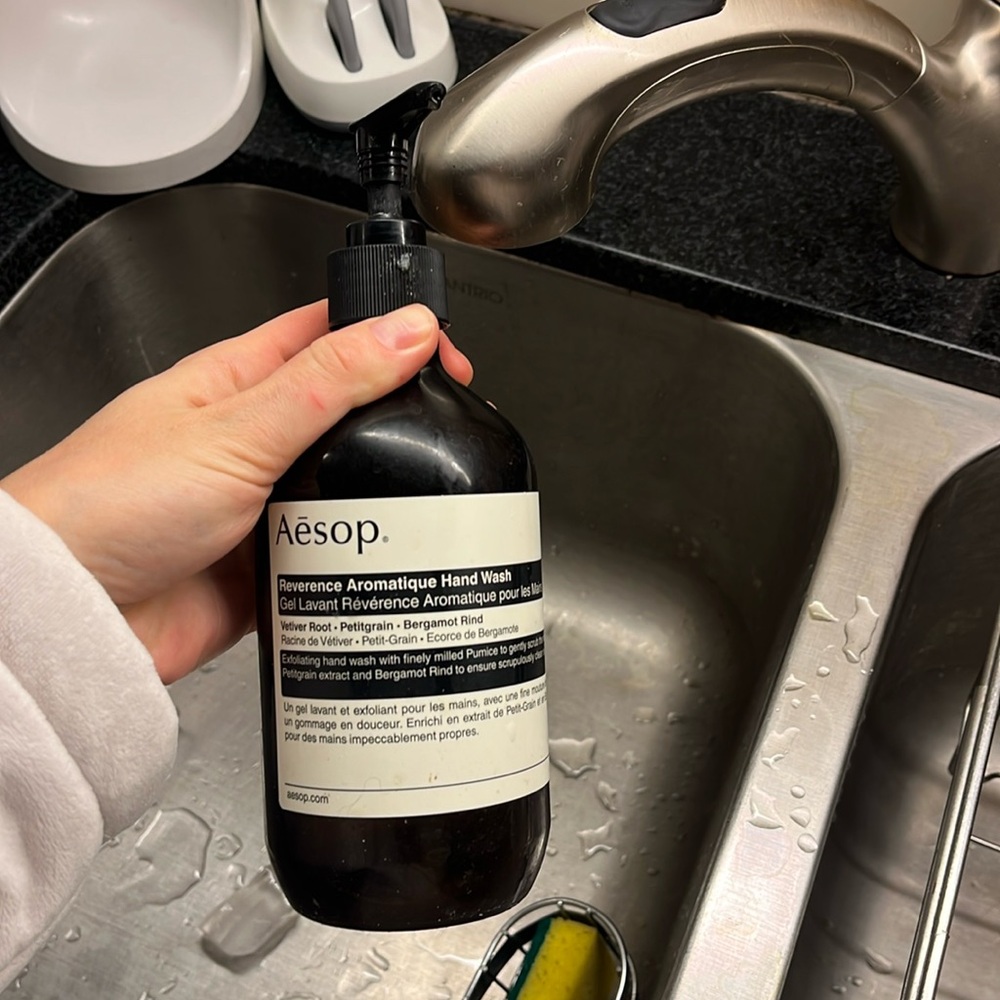 Empty Aesop hand soap bottle in good condition